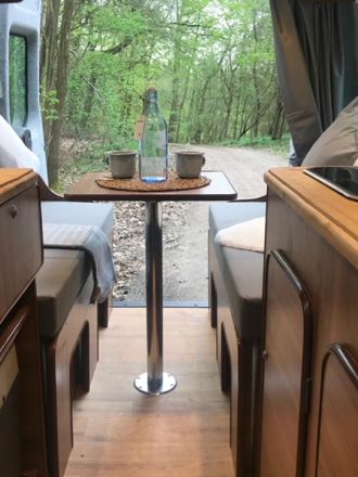 Looking out the back doors of a custom built campervan