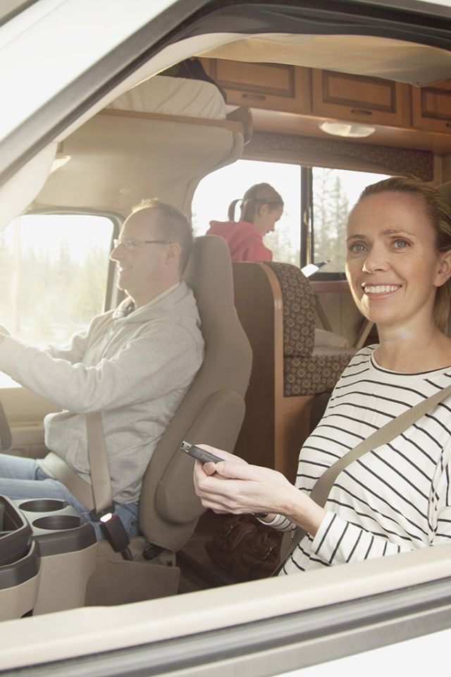 Family driving off in a new custom campervan - SCC Conversions